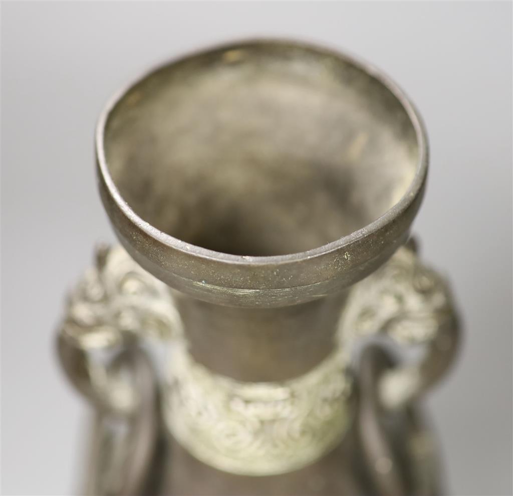 An 18th century Chinese ring-handled bronze vase, height 27cm